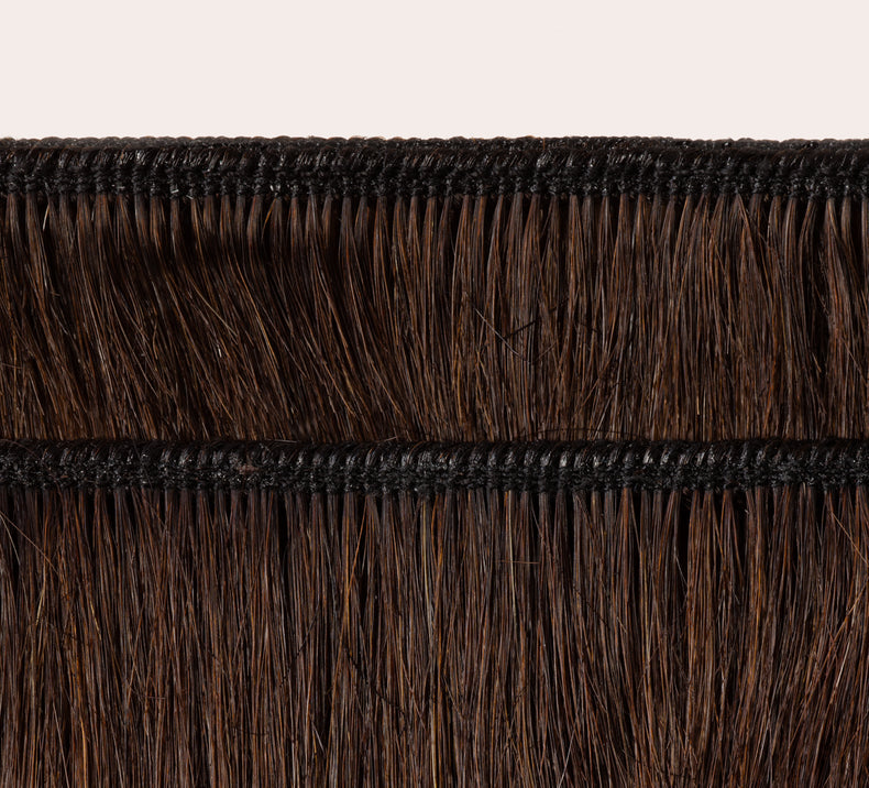 Cheveux bouclés à l'eau couleur brun chocolat